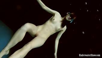 Vera Brass, A Sizzling Young Woman, In An Enticing Underwater Performance From The Czech Republic.