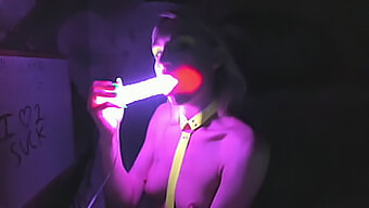 Kelly Copperfield Gives A Sensual Deepthroat Performance With A Glowing Dildo On Camera